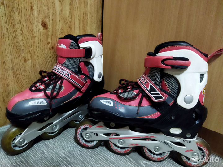 Роликовые коньки