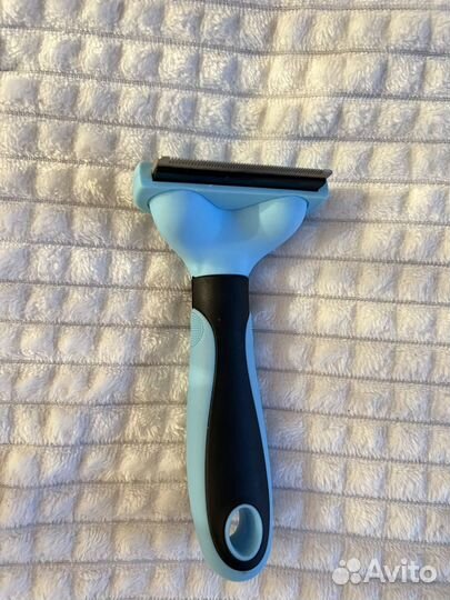 Когтерезка и фурминатор для кошек