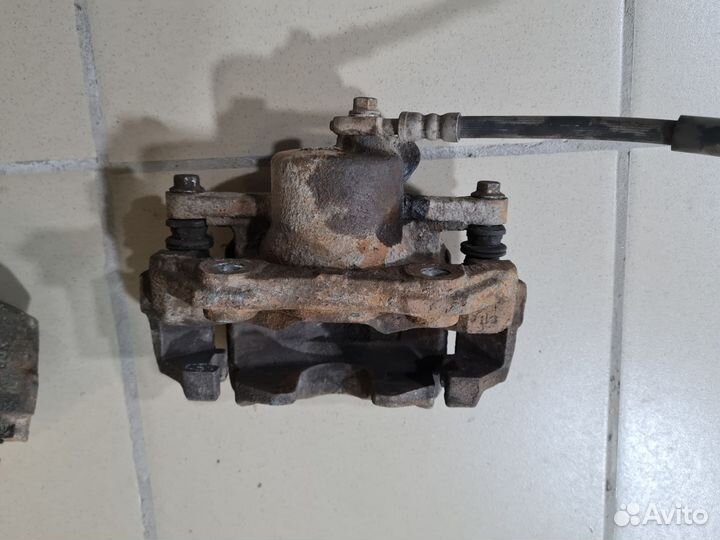 Суппорт передний Volkswagen Polo 5