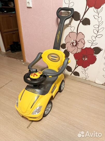 Детская музыкальная машинка -каталка