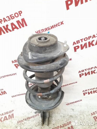 Стойка передняя левая Subaru Impreza GP7 FB20A