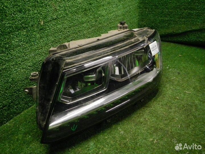 Фара левая Volkswagen Tiguan