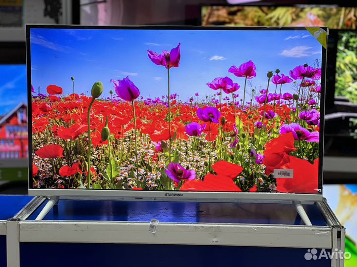 Новый белый телевизор 32