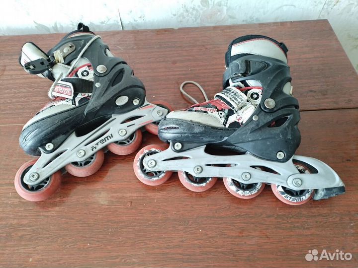 Роликовые коньки
