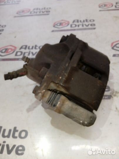 Суппорт тормозной передний правый Renault Logan 1