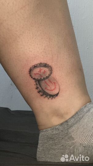 Мастер по татуировкам