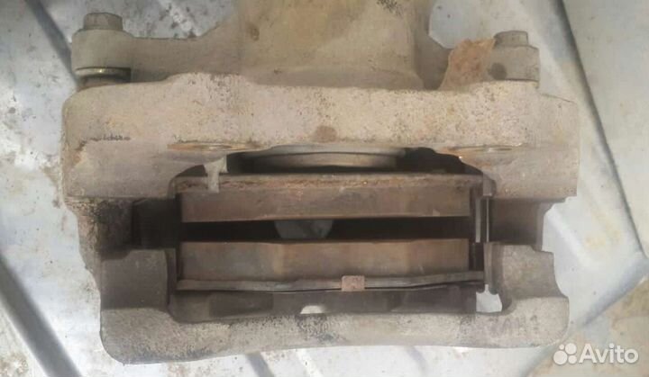 Суппорта передний Kia Spectra/Sephia II/Shuma