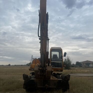 Колёсный экскаватор Hyundai R130W-3, 2003