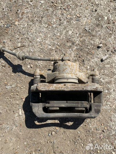 Суппорт передний левый Chevrolet Cruze