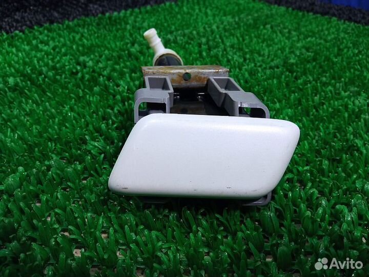 Форсунка омывателя фар левая Mitsubishi Pajero Spo