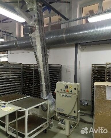 Подъемник опрокидыватель