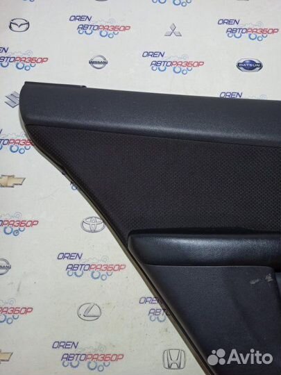 Обшивка боковой двери задняя левая Kia Cerato 2