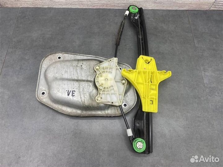 Моторчик стеклоподъемника задний левый VW Jetta