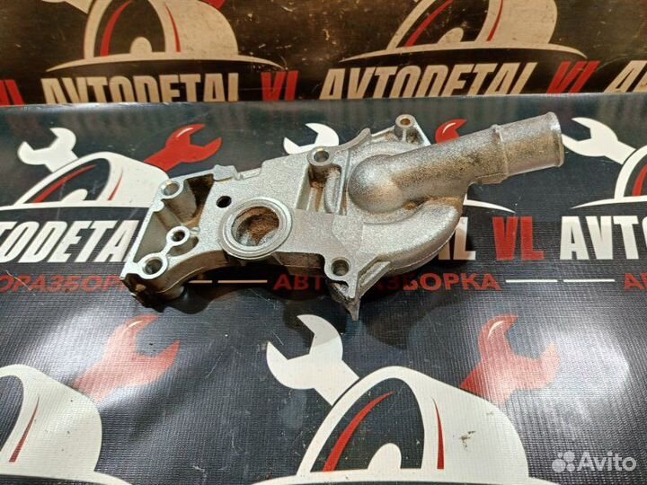 Корпус помпы Ford Focus 1 седан 2001-2007