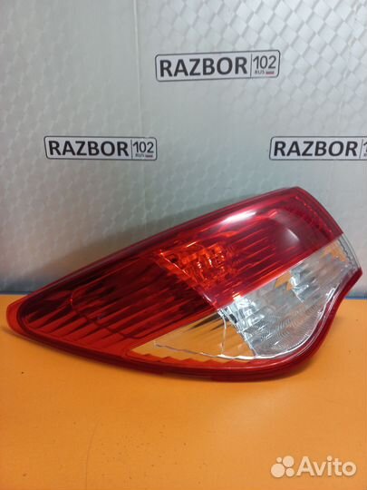 Фонарь левый наружний Nissan Almera G15