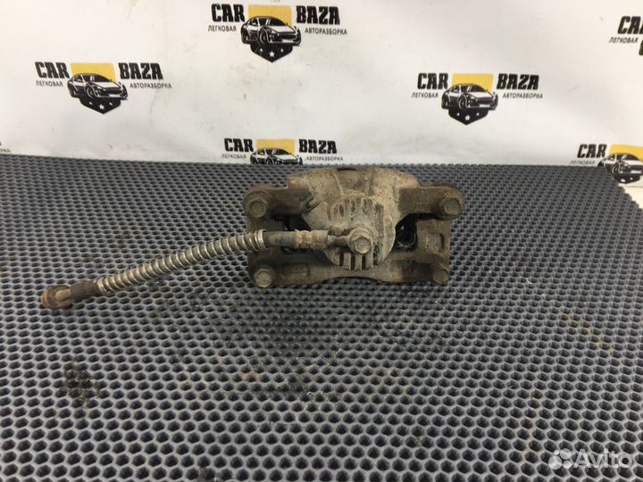 Суппорт задний левый L Kia Sorento