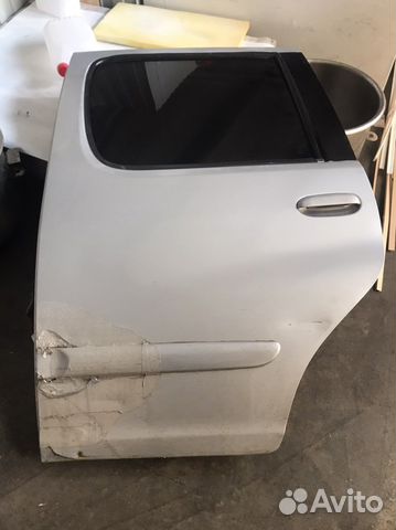 Задняя левая дверь на Toyota FunCargo