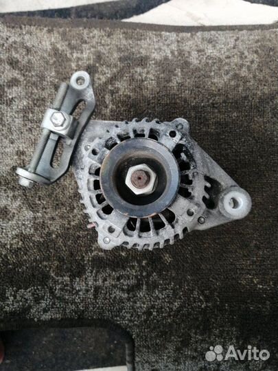 Генератор Toyota Ractis SCP100 2SZ