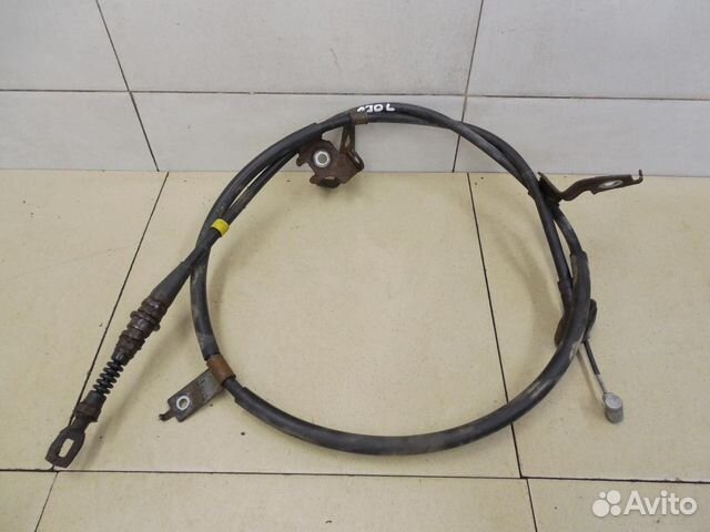 Трос стояночного тормоза левый SX4 2006-2013