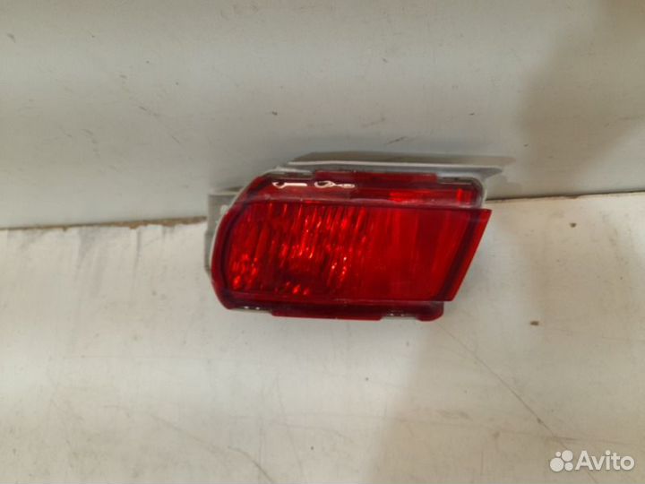 Фонарь противотуманный задний левый Toyota Land