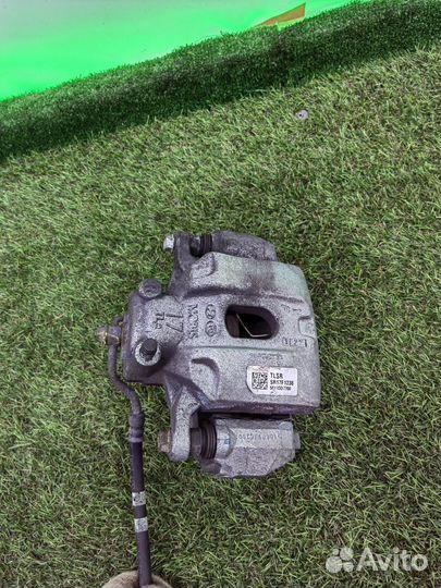 Суппорт передний правый Kia Sportage 4 QL