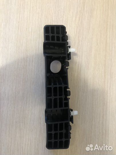 Кронштейн крепления бампера левый Kia Cerato