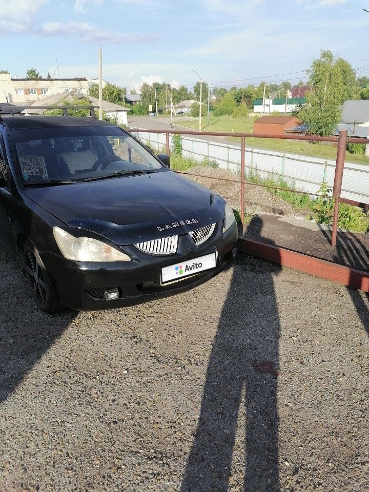 Mitsubishi Lancer: фото владельца