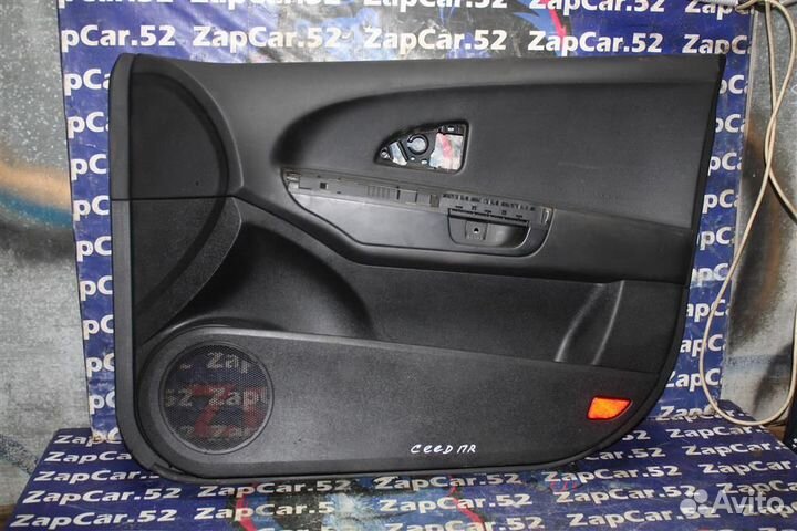 Обшивка двери передней правой Киа Сид