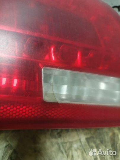 Фонарь задний в крышку багажника левый Audi A6 C6