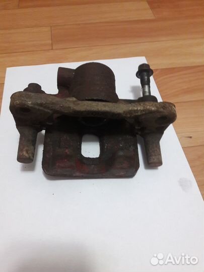 Суппорт тормозной Mitsubishi Outlander 1