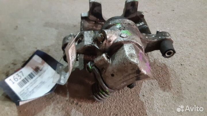 Суппорт тормозной задний левый задний левый Ford