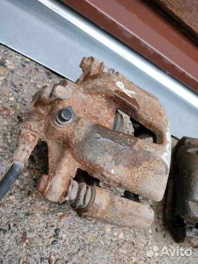 Суппорт тормозной передний правый Fiat Doblo