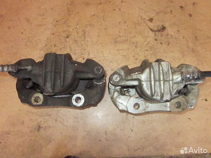 Суппорт тормозной передний Пежо партнер типи 1.6