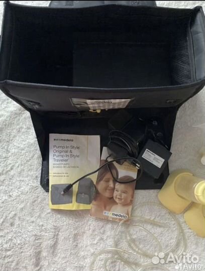 Молокоотсос medela электрический