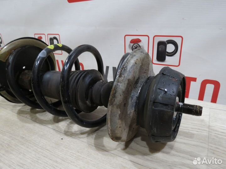 Амортизатор передний правый Nissan Almera G15