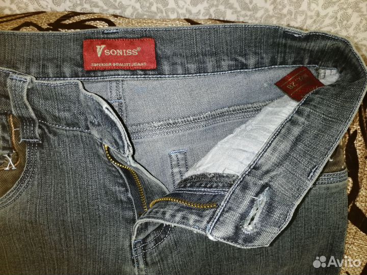 Джинсы клеш от колена