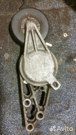 Натяжитель ремня VAG 058903133C