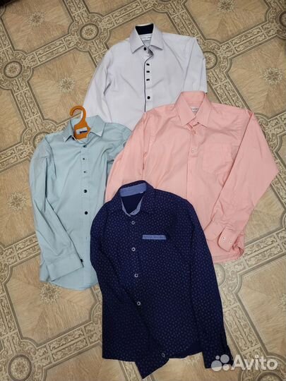 Рубашки на мальчика 128-134