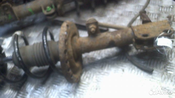 Амортизатор подвески Nissan Note E11, 2009