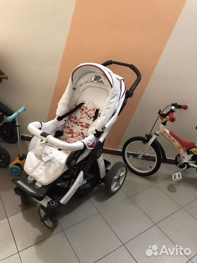 Детская прогулочная коляска hartan