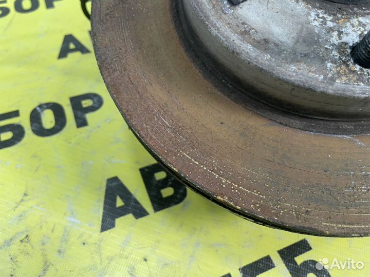 Кулак передний левый Chevrolet Lacetti