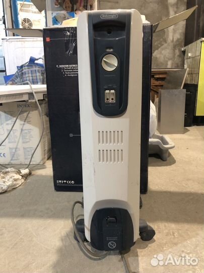Масляный обогреватель delonghi