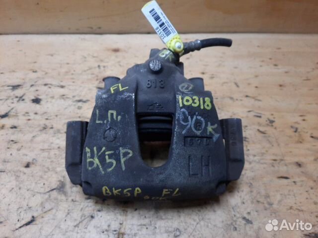 Суппорт передний левый Mazda Axela BK5P zyve 2004