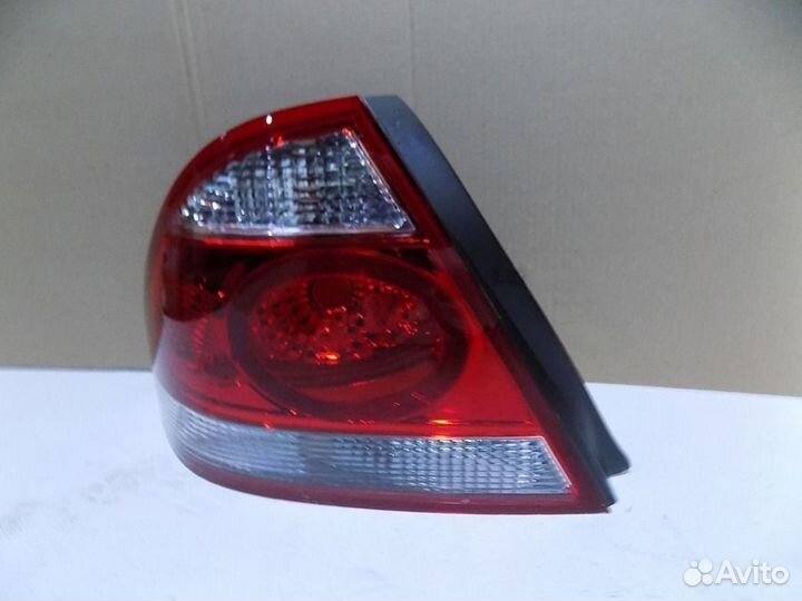 Фонарь задний левый Ниссан Альмера Классик 2007-13