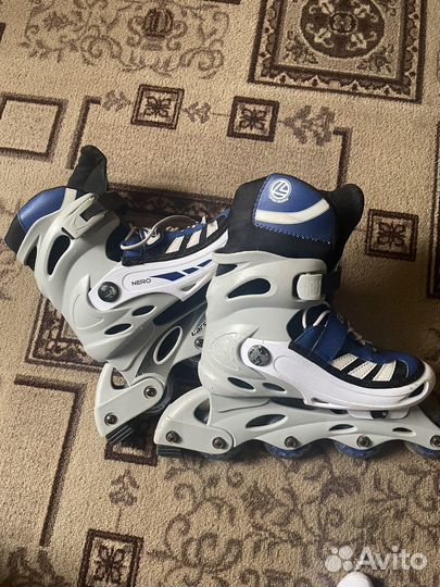 Роликовые коньки