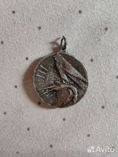 Какой-то Значок