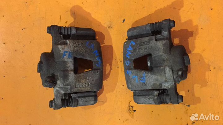 Суппорт тормозной передний Chevrolet Lanos