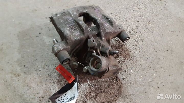 Суппорт тормозной задний правый Ford Focus Ii