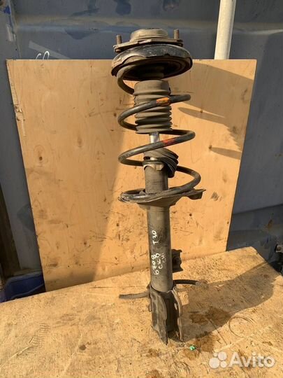 Стойка амортизатор задний левый Nissan X-Trail t30