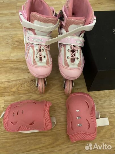 Роликовые коньки